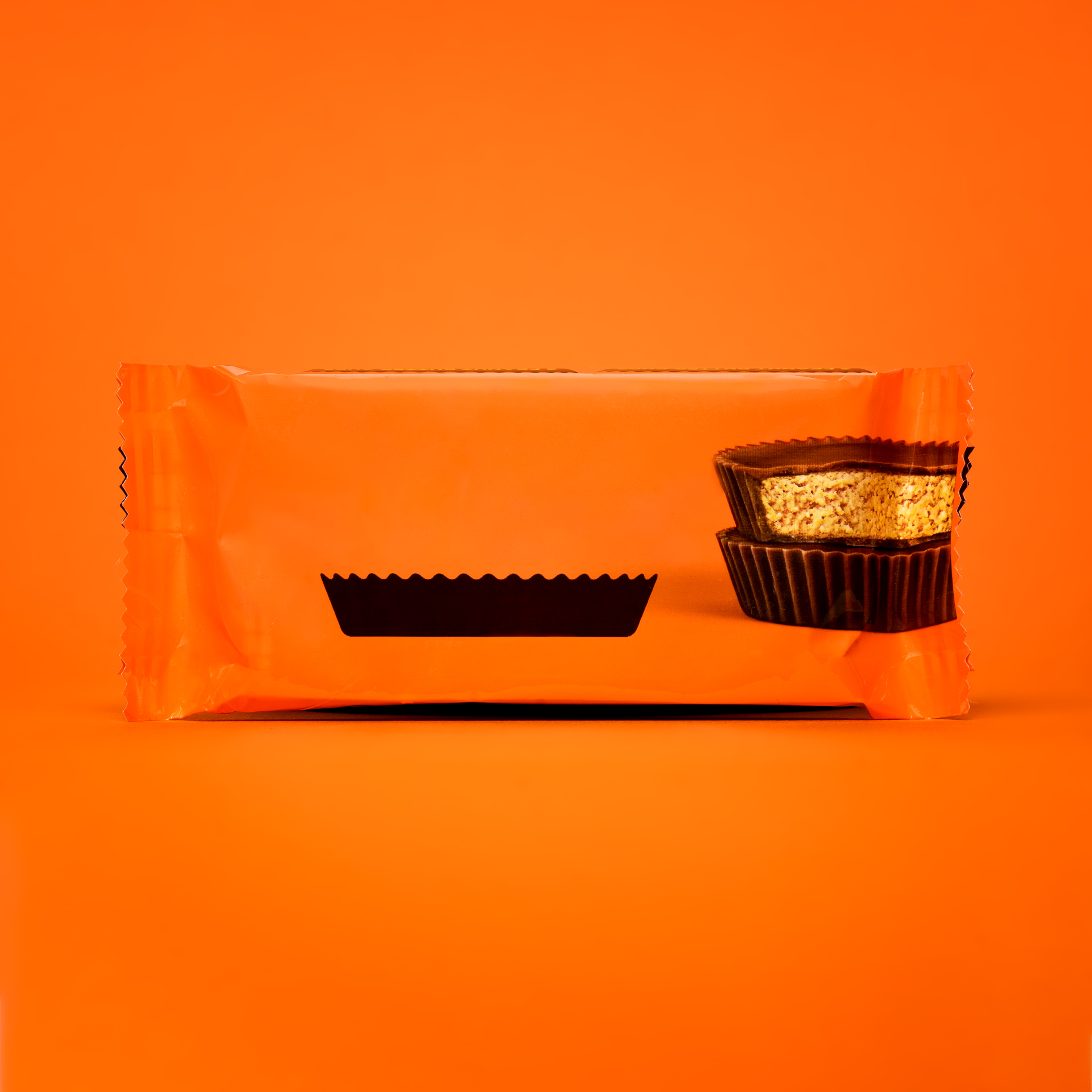 A Reese's cup wrapper with no words